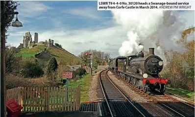  ?? ?? LSWR T9 4-4-0 No. 30120 heads a Swanage-bound service away from Corfe Castle in March 2014. ANDREW PM WRIGHT