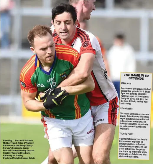  ?? Photo by Michelle Cooper Galvin ?? Bear Hug ..... Darran O’Sullivan Mid Kerry and Aidan O’Mahony Rathmore in the Kerry County Garvey’s Supervalu Senior Football Championsh­ip Quarter final in Fitzgerald Stadium, Killarney on Sunday