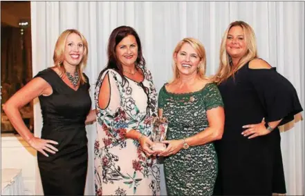  ?? SUBMITTED PHOTOS ?? Debbie Martin, director of operations, poses with Jennifer DeLaney, second from the left, who is this year’s Executive Director of the Year award winner, Kristen M. Waterfield, president and co-founder and Alicia Pavlik, right, business operations...