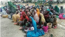  ?? EPA ?? Some of the 700 people who escaped Boko Haram militants