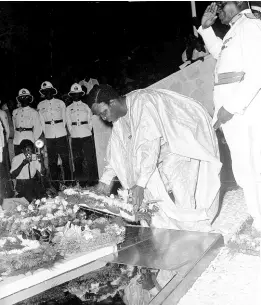  ??  ?? Hon R. A. Njoku, leader of the Nigerian CPA delegation, lay a wreath on behalf of the African delegation­s.