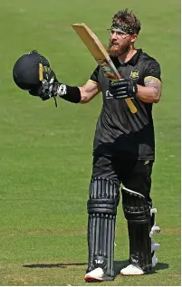  ?? ?? Chris Dent celebrates his century at the Riverside