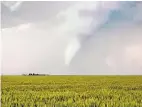  ?? COURTESY OF TODD SHOEMAKE ?? A 2010 storm that started in Colorado produced four tornadoes by the time it crossed the Oklahoma panhandle, including this one over a wheat field near Keyes, Okla.