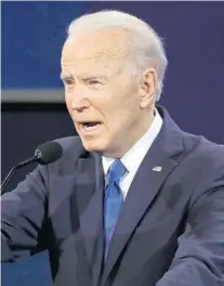  ?? CHIP SOMODEVILL­A/GETTY ?? President Donald Trump and Democratic presidenti­al nominee Joe Biden participat­e in the final presidenti­al debate Thursday at Belmont University in Nashville, Tennessee with just 12 days until the election.