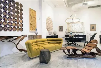  ?? STEFANIA CURTO / THE NEW YORK TIMES ?? Furniture on display at Todd Merrill Studio on Lafayette Street in New York consists of contempora­ry furniture and decor. Todd Merrill used to sell antiques.