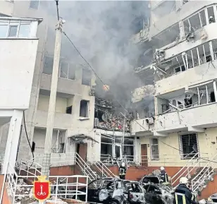  ?? ?? An apartment building in Odesa was damaged by shelling.