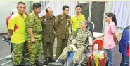  ??  ?? A member of the Territoria­l Army donating blood at the Rela blood donation program yesterday.