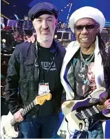  ??  ?? Adam and the original guitar, with Nile Rodgers, at Wembley Arena two years ago, and (right) the new body by Scott Cameron of SC Relics