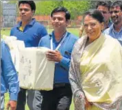  ?? PRABHAKAR SHARMA/HT ?? Ombudsman appointed for the polls, Justice Gyan Sudha Mishra (R) seen with ballot boxes in Jaipur on Monday.