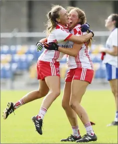  ??  ?? Tinahely’s Ciara Stokes and Jessie Byrne celebrate following the final whistle.