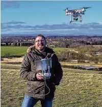  ??  ?? Mark Bradshaw with his Phantom 3 drone and a still from his footage of the stranded taxi (left)