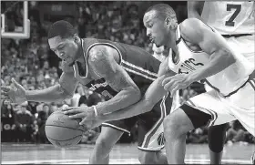  ?? AP/MICHAEL DWYER ?? Boston’s Avery Bradley (right) knocks the ball away from Washington’s Bradley Beal during the fourth quarter of Sunday’s game. The top-seeded Celtics got off to a slow start but rebounded to put away the Wizards 123-111 in the opener of their NBA Eastern Conference semifinal playoff series.