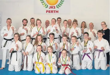  ??  ?? The team from the Perth JKS (Japan Karate Shotorenme­i) who competed in the JKS Scotland National Championsh­ips at Grangemout­h and returned with over 17 medals. The club welcomes new members from the age of three. Phone Haley on 07850 406806.