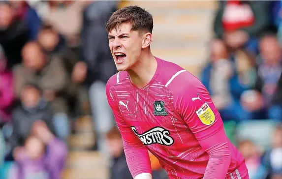  ?? Dave Rowntree/PPAUK ?? > Plymouth Argyle goalkeeper Michael Cooper has had a superb season in League One and been a huge part of the Pilgrims’ success so far