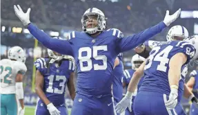  ?? MATT KRYGER/INDYSTAR ?? Colts tight end Eric Ebron celebrates his first-half touchdown Sunday.