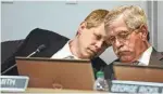  ?? STAFF PHOTO BY ANGELA LEWIS FOSTER ?? Dr. Jonathan Welch, left, speaks to Superinten­dent Rick Smith on Thursday during the Hamilton County school board meeting about the vote to ask the County Commission for a $34 million budget boost.