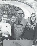  ?? TODD KUNIS ?? Todd Kunis, 52, who resides in Murrieta, Calif., pictured with three of his daughters.