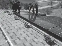  ?? CONTRIBUTE­D PHOTOS ?? An example of solar panel installati­on.