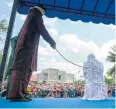  ?? AFP ?? A woman is flogged in front of a mosque in the capital Banda Aceh.