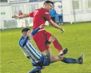  ?? Paul Watson/FJA Photograph­y ?? Runcorn Town striker Craig Lindfield fires a shot goalwards against Newcastle Benfield during the teams’ remarkable FA Vase third round encounter last Saturday.
