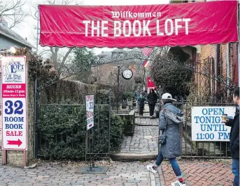  ?? PHOTOS: JONATHAN ELDERFIELD/THE ASSOCIATED PRESS ?? The Book Loft of German Village in Columbus, Ohio, which opened more than 40 years ago, features 150,000 individual titles and over 500,000 books in stock. The store brims with shoppers and is open seven days a week.