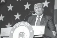  ?? ANNA MONEYMAKER/GETTY IMAGES ?? Former President Donald Trump campaigns in Columbus, Ga., on June 10.