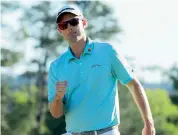  ?? — AFP ?? Justin Rose reacts after making a putt for birdie on the 18th green in the third round on Saturday.