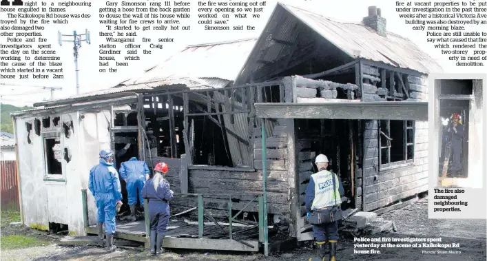  ?? Photos/ Stuart Munro ?? The fire also damaged neighbouri­ng properties. Police and fire investigat­ors spent yesterday at the scene of a Kaikokopu Rd house fire.