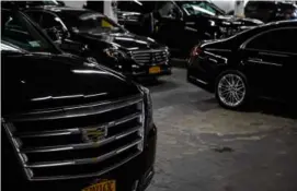  ?? AUNDRE LARROW/NEW YORK TIMES ?? The fleet at Attitude, a car service in New York City, which sold its last traditiona­l stretch limousine eight years ago.