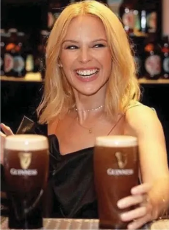  ??  ?? Pint-sized: Kylie Minogue popped to Dublin’s Guinness Storehouse this week