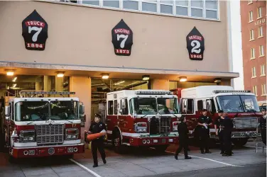  ?? Jessica Christian / The Chronicle ?? Members of the San Francisco Fire Department line up fire trucks at San Francisco Fire Station 7 in the Mission district. As many as 60 department employees have tested positive for coronaviru­s in December.