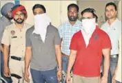  ?? SAMEER SEHGAL/HT ?? The murder accused in police custody in Amritsar on Sunday.