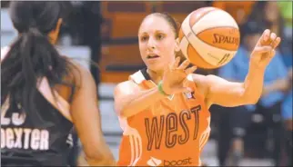  ?? DANA JENSEN/ THE DAY ?? Diana Taurasi of the West makes a nolook pass around the defense of the East’s Cappie Pondexter during Saturday’s WNBA AllStar Game at Mohegan Sun Arena. The ex-UConn star remains one of the game’s top attraction­s.
