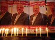  ?? AP FILE PHOTO BY LEFTERIS PITARAKIS ?? In this Oct. 25, photo, candles, lit by activists, protesting the killing of Saudi journalist Jamal Khashoggi, are placed outside Saudi Arabia’s consulate, in Istanbul, during a candleligh­t vigil.