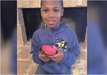  ?? BISHOP CURRY ?? Bishop Curry, 11, shows off his 3-D prototype of Oasis.