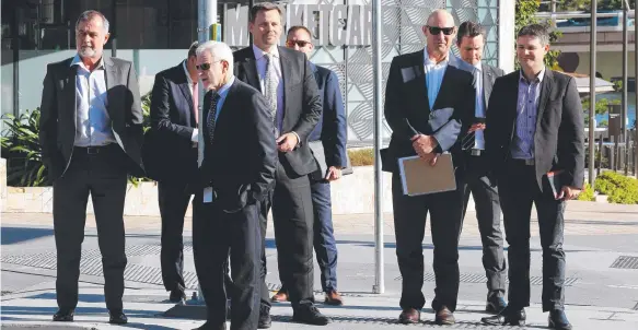  ?? Picture: AAP IMAGE ?? BHP’s Rag Udd and other mining executives leave the meeting with Treasurer Jackie Trad yesterday.