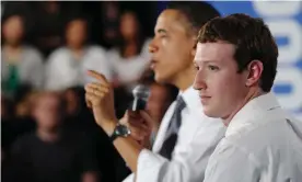  ?? Photograph: Mandel Ngan/AFP/Getty Images ?? Barack Obama speaks as the Facebook CEO, Mark Zuckerberg, looks on at Facebook headquarte­rs in Palo Alto, California.