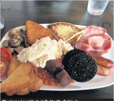  ??  ?? The large breakfast at Butterfly Cabinet