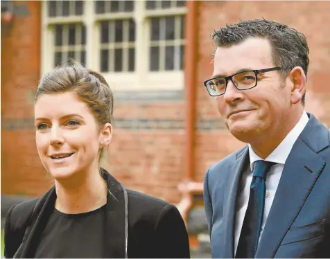  ??  ?? Victorian Premier Daniel Andrews with Clare Burns during a visit to Northcote Primary School.