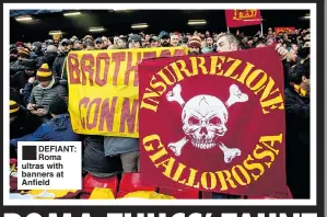  ??  ?? ■ DEFIANT: Roma ultras with banners at Anfield