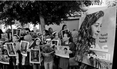  ?? FOTOS:AFP ?? NIÑOS Y jóvenes palestinos exigieron la liberación de la activista
