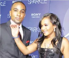  ??  ?? Bobbi Kristina arrives with boyfriend Gordon at the premiere of the new film ‘Sparkle’ in Hollywood on Aug 16, 2012. — Reuters file photo