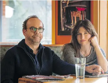  ?? — DISNEY — NETFLIX ?? Kathryn Hahn, here with Paul Giamatti, provides an achingly human performanc­e in Private Life that sets her apart and warrants Oscar recognitio­n.