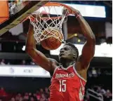  ?? Karen Warren / Houston Chronicle ?? Center Clint Capela gives the Rockets a unique scoring weapon inside as well as a rim protector. His contributi­ons will be missed the next two games as he recovers from an orbital bone fracture.