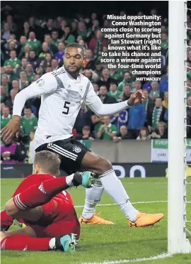  ?? MATT MACKEY ?? Missed opportunit­y:
Conor Washington comes close to scoring against Germany but
Ian Stewart (right) knows what it’s like to take his chance and score a winner against the four-time world
champions