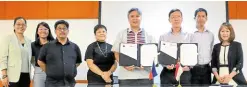  ?? —JEFFERSON VILLACRUZ/UP DILIMAN INFORMATIO­N OFFICE ?? UP Diliman Chancellor Edgardo Carlo Vistan II and Republic Polytechni­c’s senior director (Student Services) Ashley Chua (fifth and sixth from left) at the memorandum of understand­ing signing at UPD-CS Administra­tion Building Auditorium