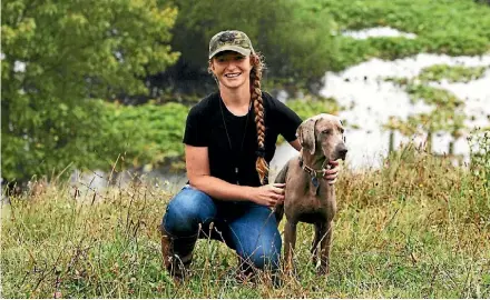  ?? LUKE KIRKEBY ?? Marian Brenssell is living her dream, running a doggy daycare at Red Brae Farm.