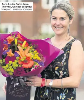  ?? MATTHEW HORWOOD ?? Anna-Louise Bates, from Thornhill, with her delightful bouquet