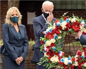  ??  ?? (Left) President-elect Joe Biden with wife Jill; and (right) President Donald Trump with first lady Melania Trump observe Veterans Day in Philadelph­ia and Arlington National Cemetery in Arlington, respective­ly, on Wednesday. — Reuters, AP