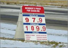  ?? NEWS PHOTO GILLIAN SLADE ?? The price for gas dropped below a dollar per litre at Costco members in Medicine Hat on Tuesday. Fas Gas Plus and Mobil were following closely behind at 100.9 cents per litre in the afternoon, as collapsing oil prices bring down consumers’ costs at the pump.